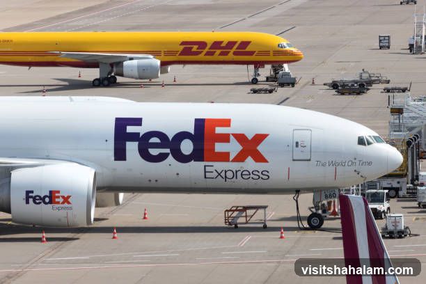 FedEx and DHL Airplanes on Tarmac