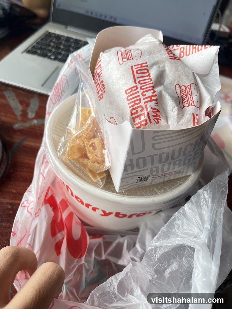 Burger and side dish in packaging