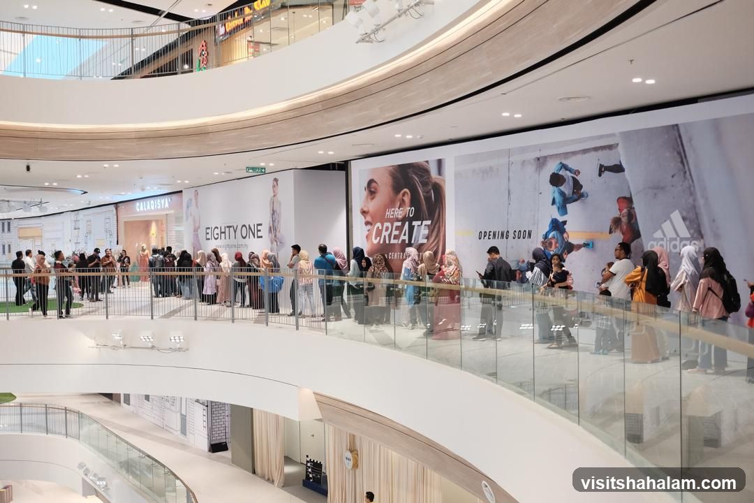 People queuing in a shopping mall