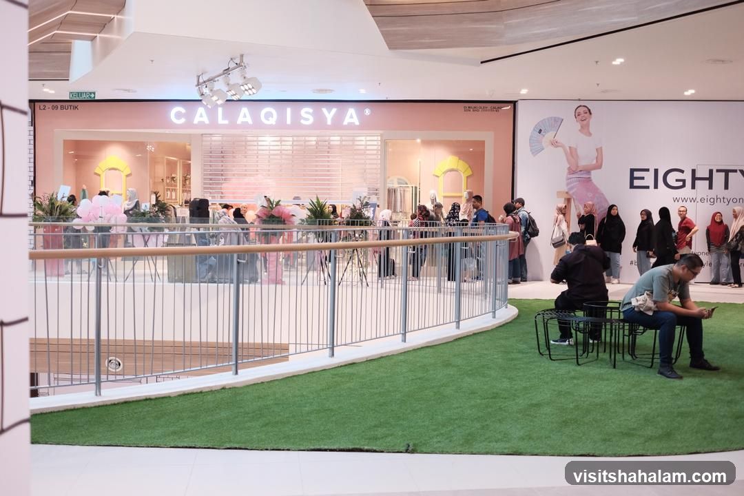 Shopping Mall Interior with Storefront and Advertisement