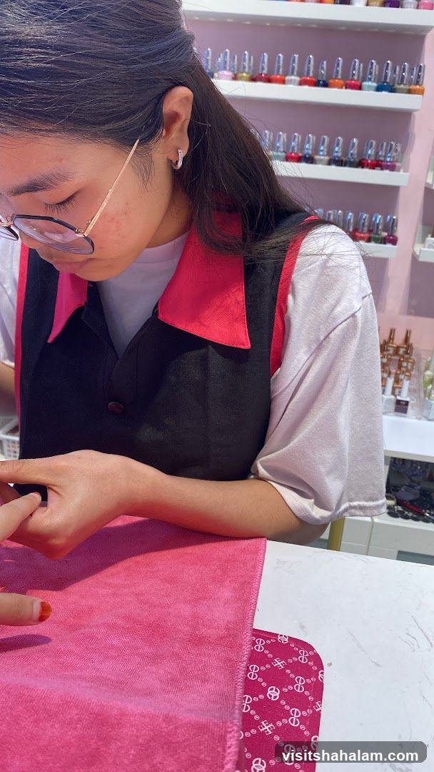 Nail Technician Working