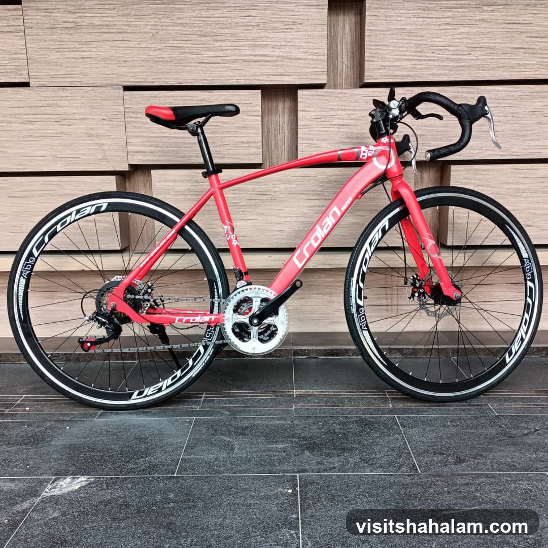 Red bicycle with "Crolan" branding