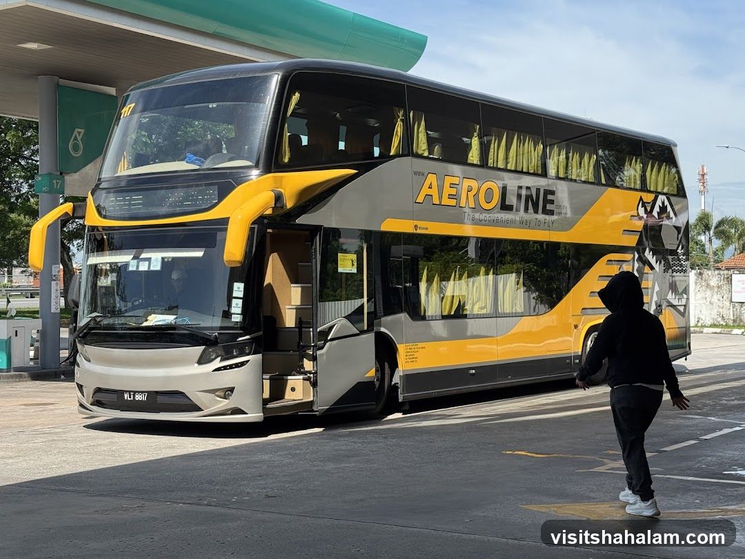 Double Decker Bus at Gas Station