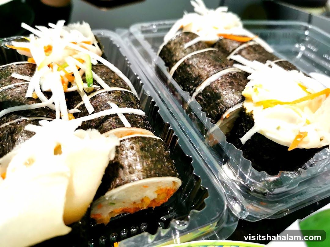 Sushi Rolls in Takeout Containers