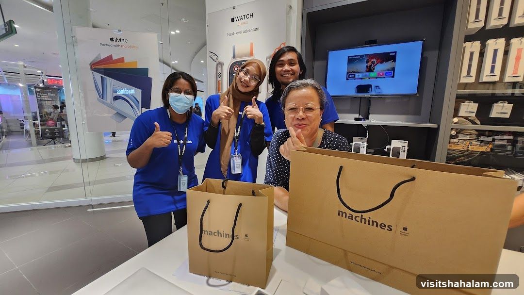 Apple Store Staff with Customer
