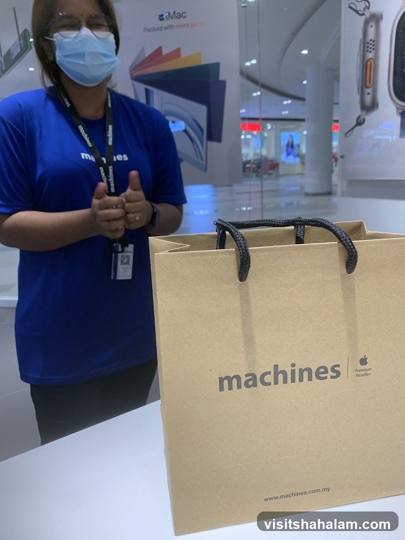 Apple Reseller Staff with Shopping Bag