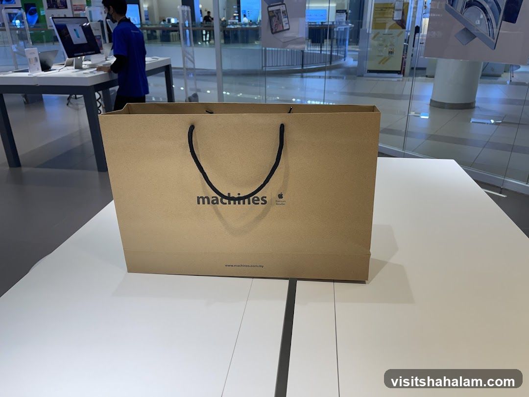 Brown paper shopping bag with logo