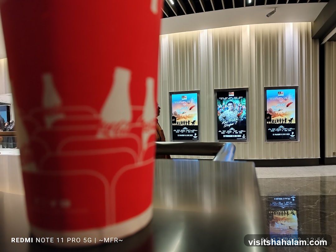 Movie Posters and Drink Cup