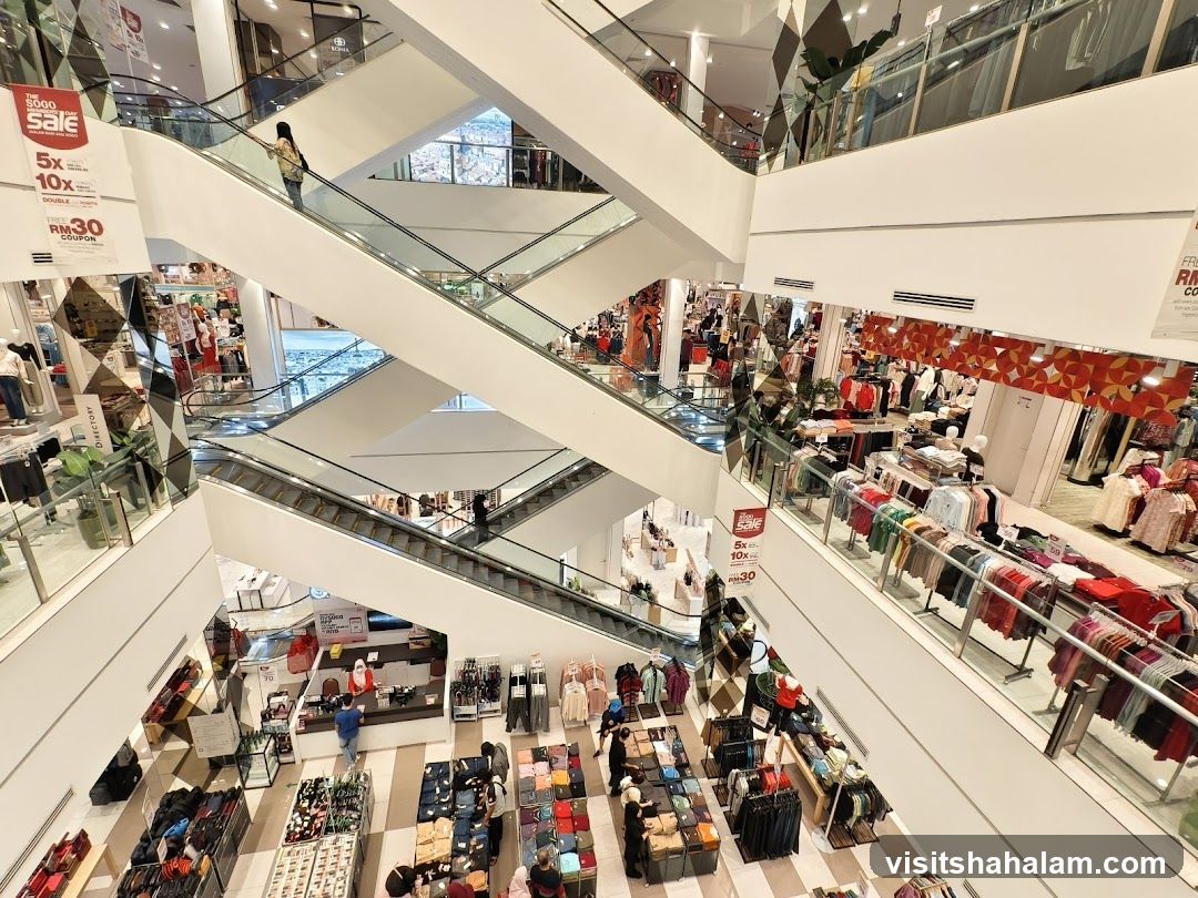 Department Store Interior with Escalators and Merchandise