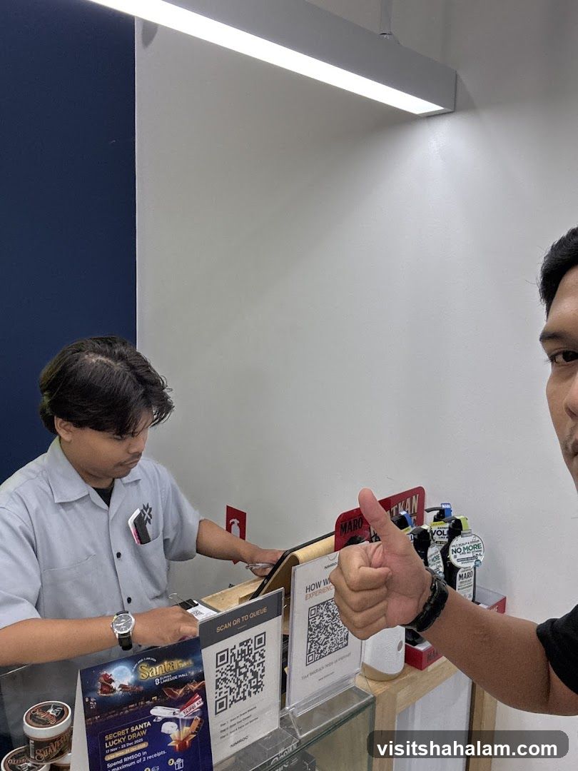 Customer Giving Thumbs Up at Counter