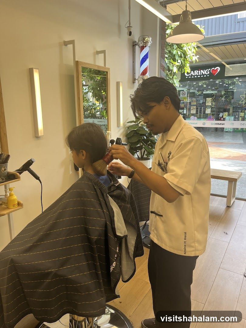 Barber cutting hair