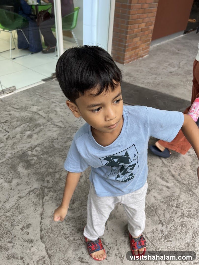 Boy in blue t-shirt