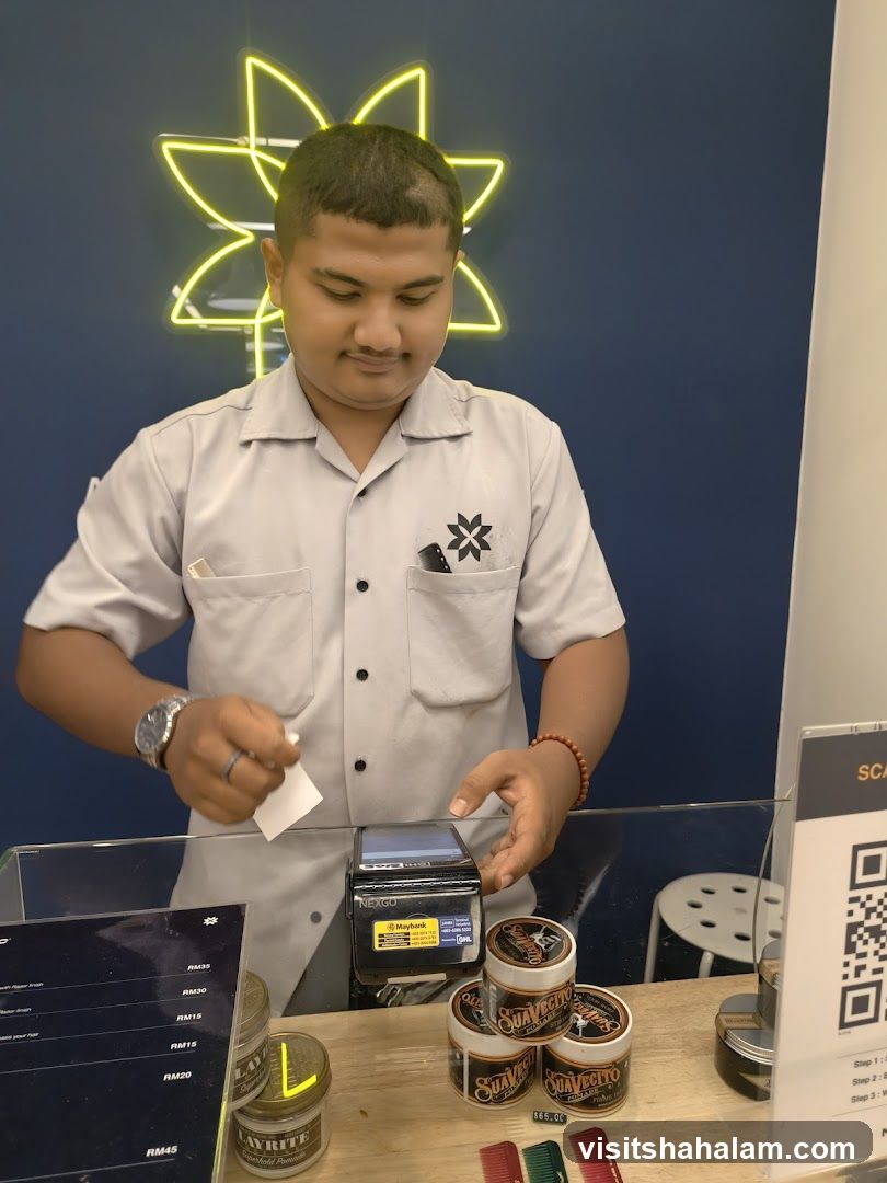 Barber making a payment