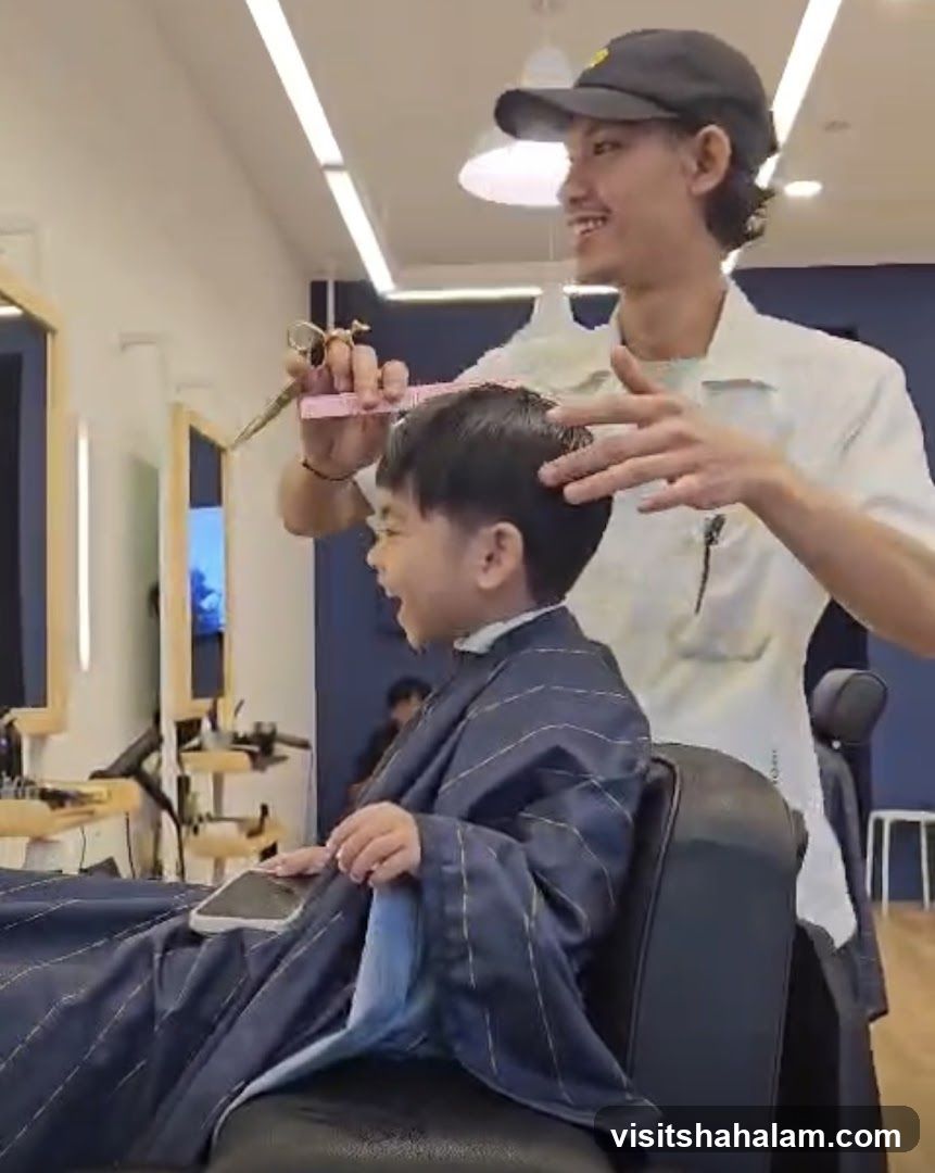 Barber cutting a child's hair