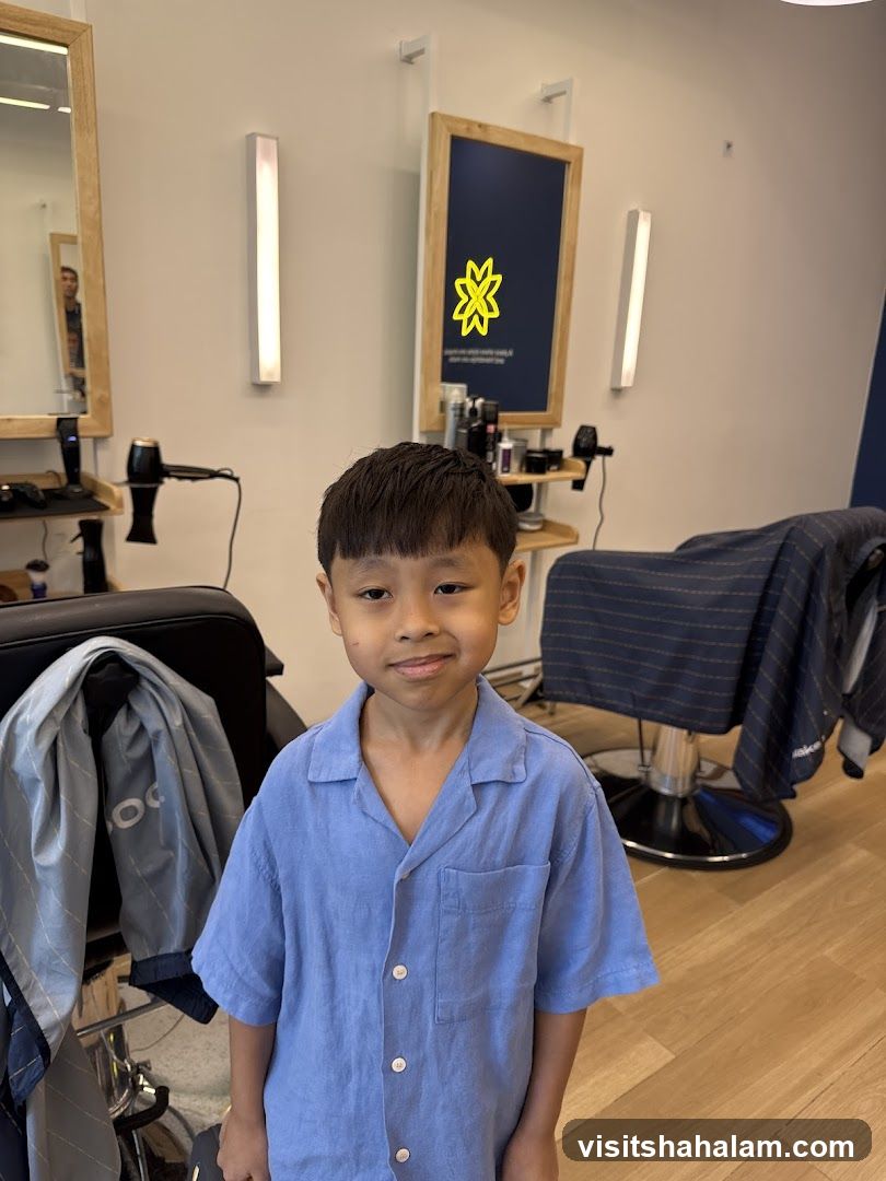 Young boy in a barber shop