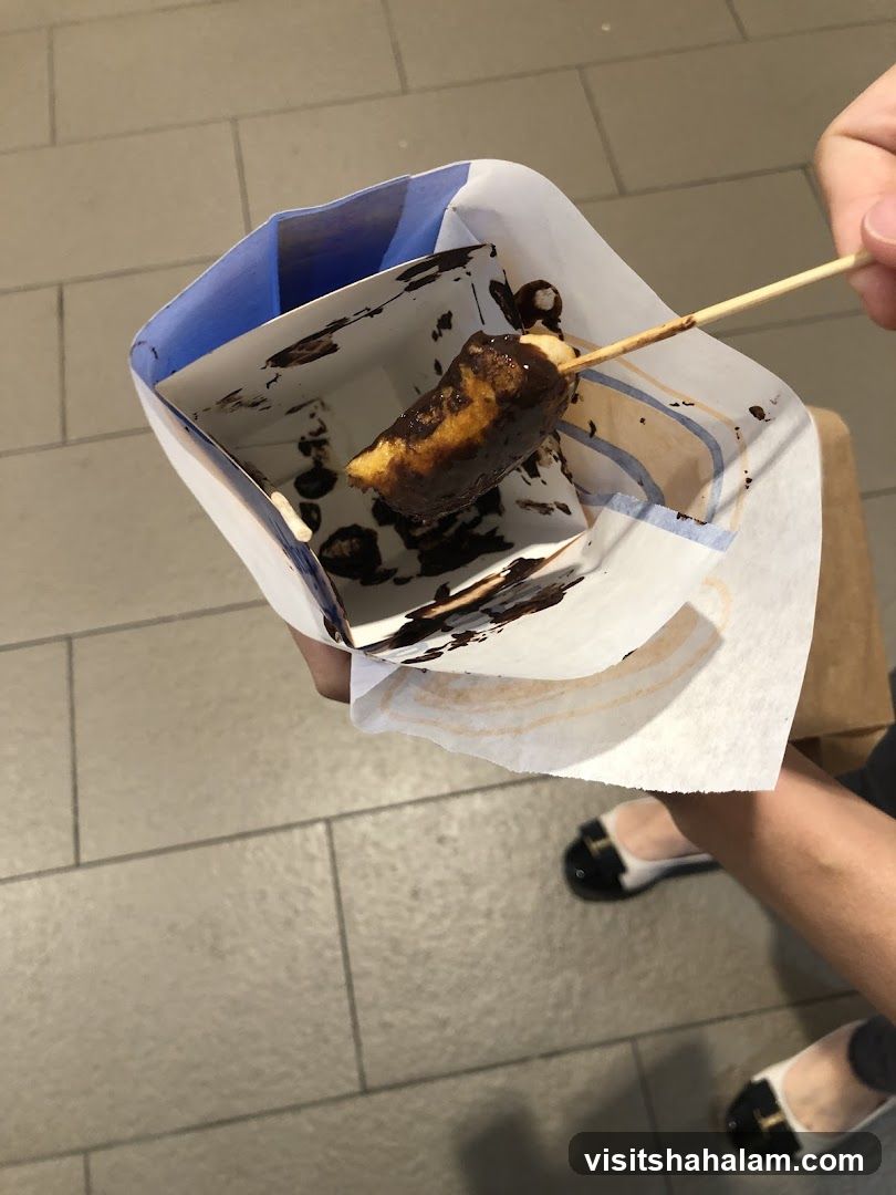 Chocolate-covered banana on a stick
