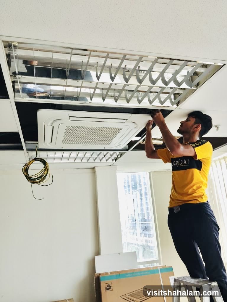 Man installing air conditioner