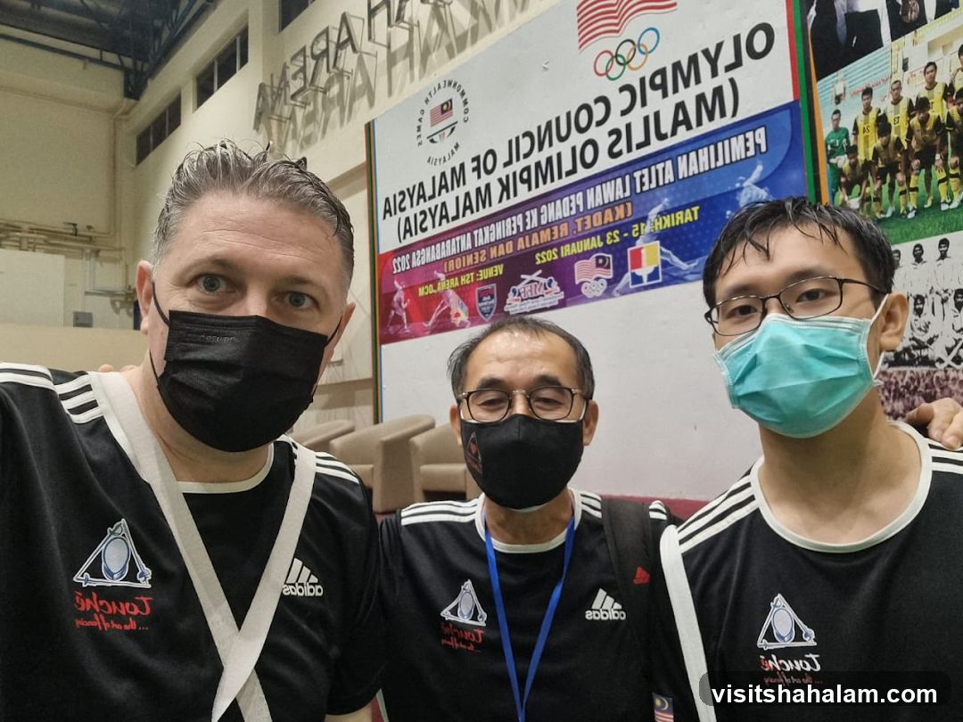 Three Men in Masks and Athletic Wear