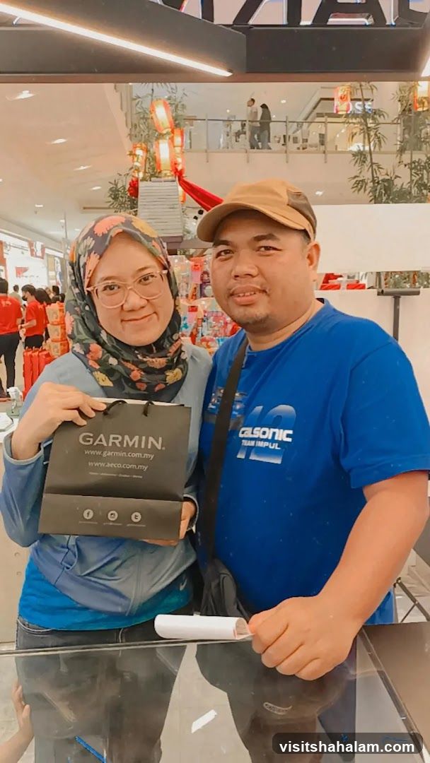 Couple with Garmin Bag