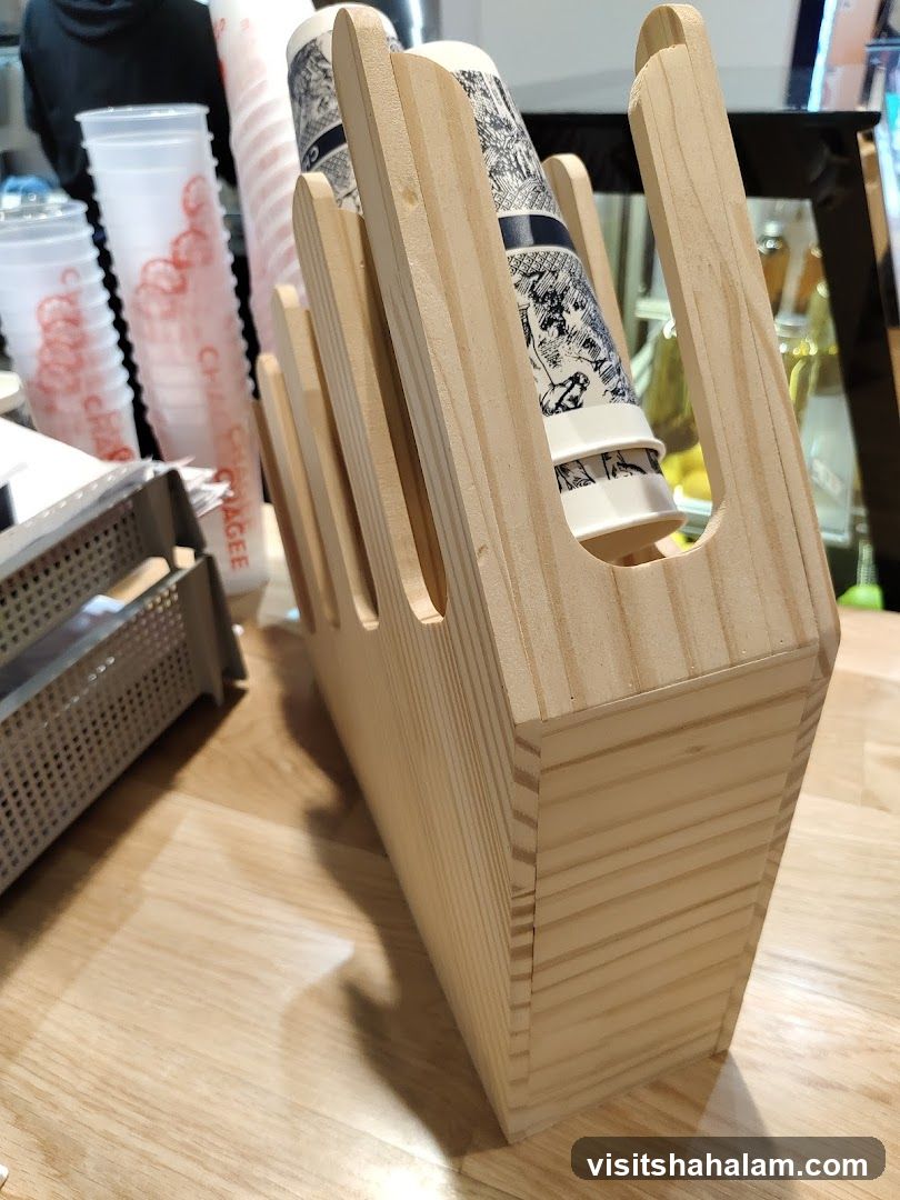 Wooden cup holder with stacked cups