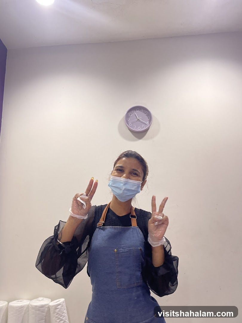 Woman in Apron Making Peace Signs