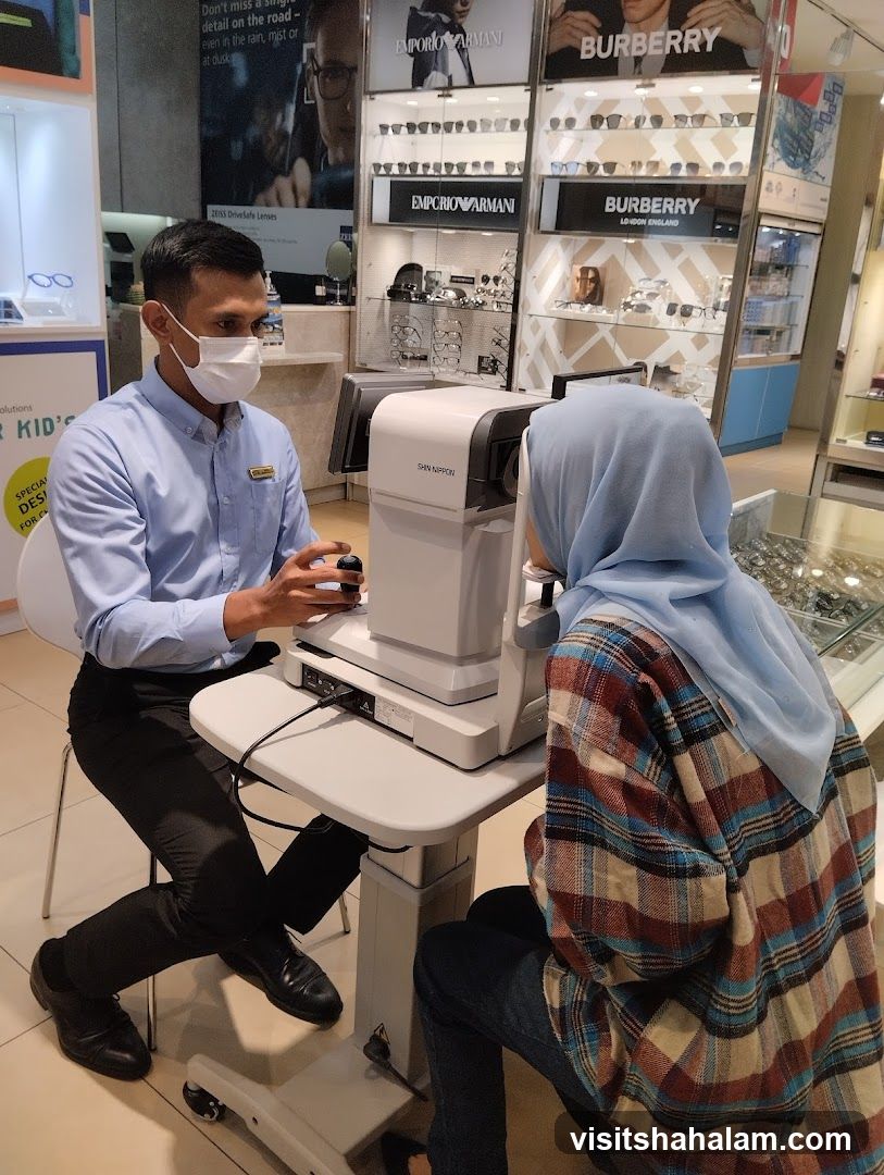 Optometrist examining a patient