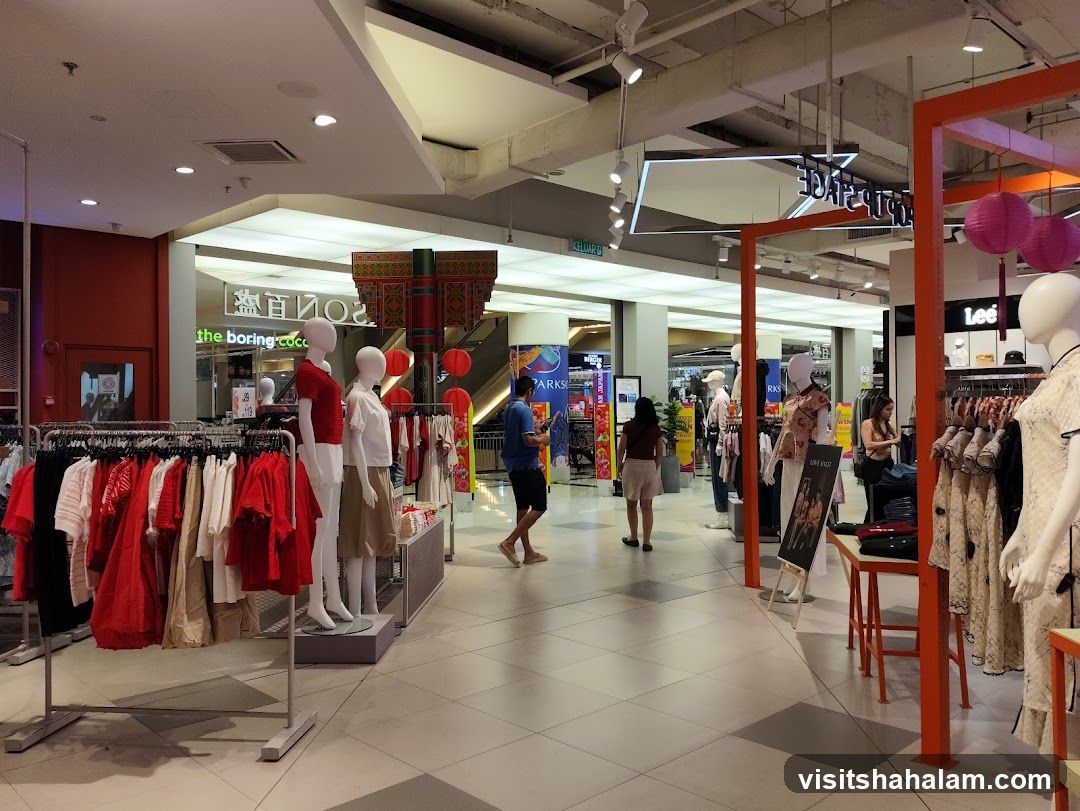 Clothing store interior with mannequins and clothing racks