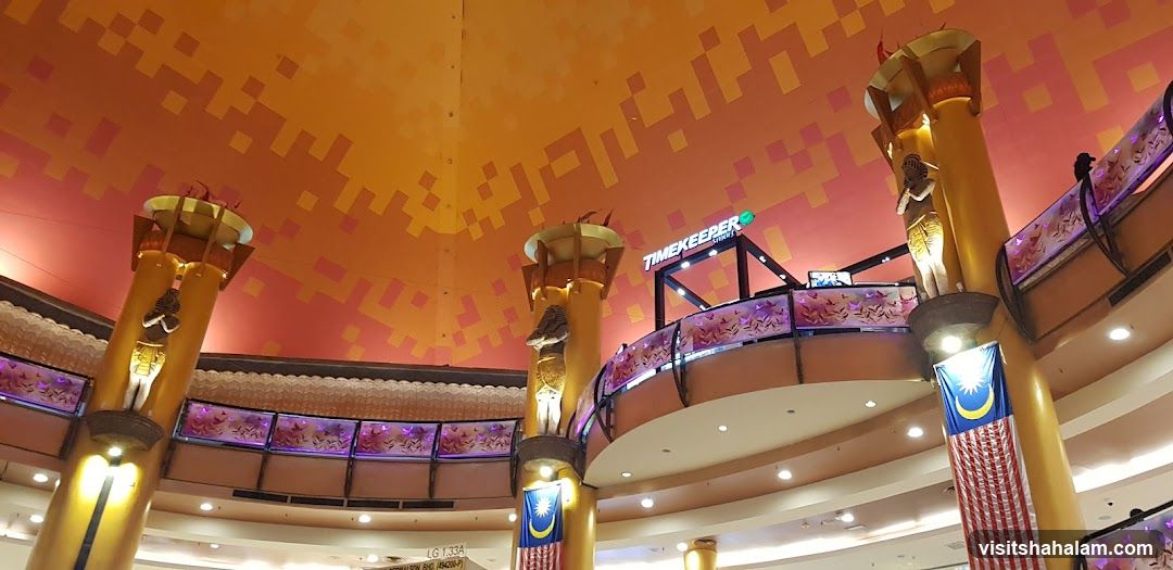 Interior of a shopping mall with Egyptian-themed columns