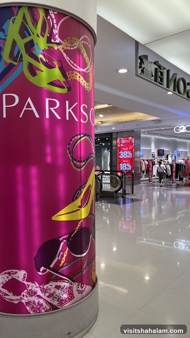 Mall Interior with Fashion Store Promotions