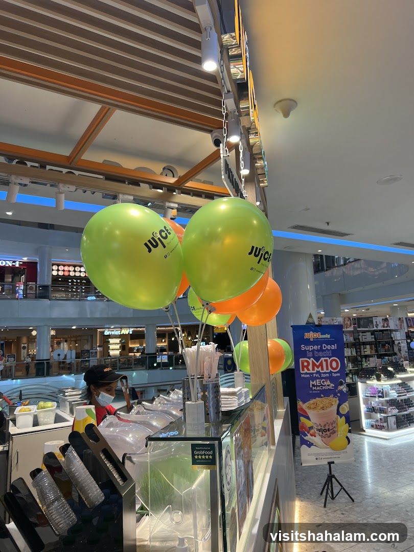 Juice Bar Counter with Balloons and Promotion
