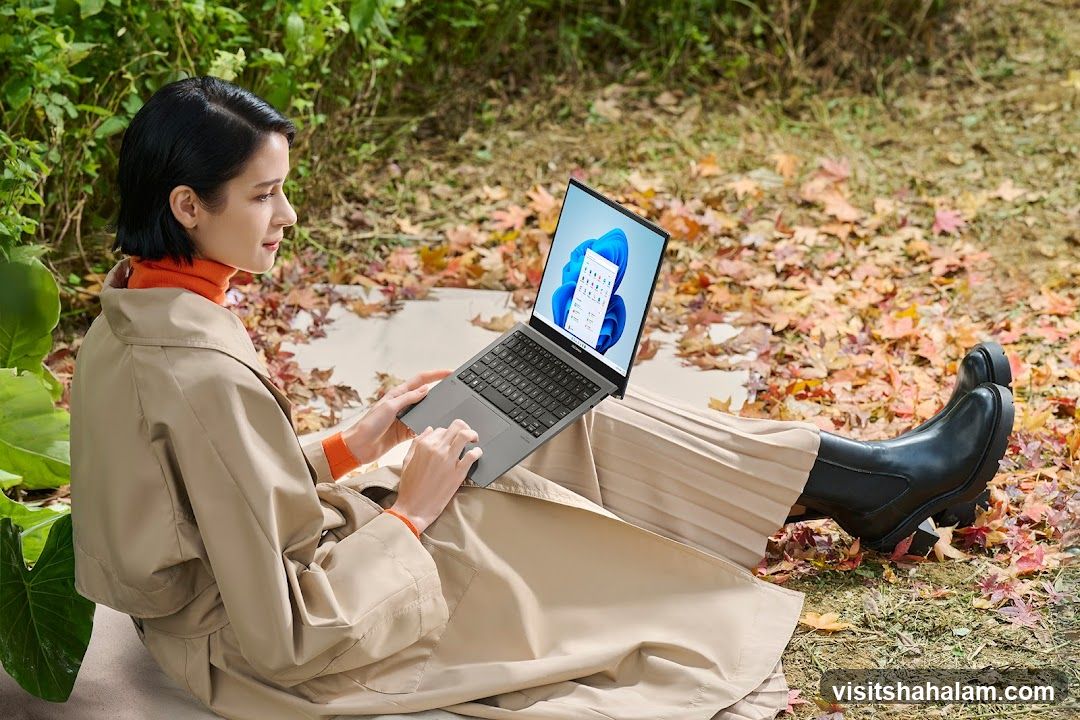 Woman using a laptop outdoors