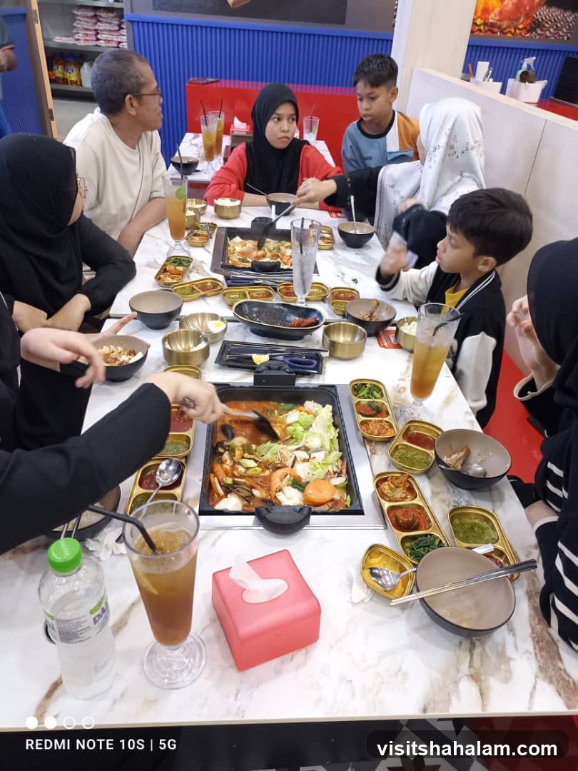 Family enjoying a meal at a restaurant