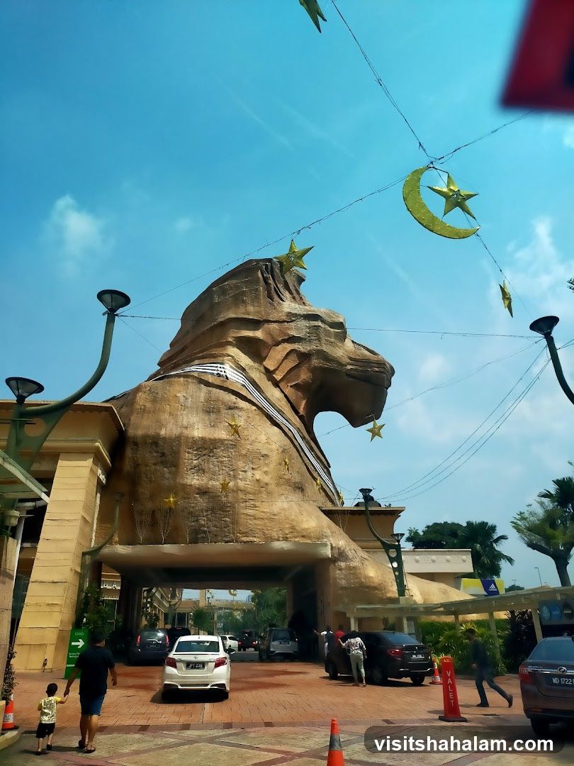 Sphinx-shaped entrance with crescent moon and star decorations