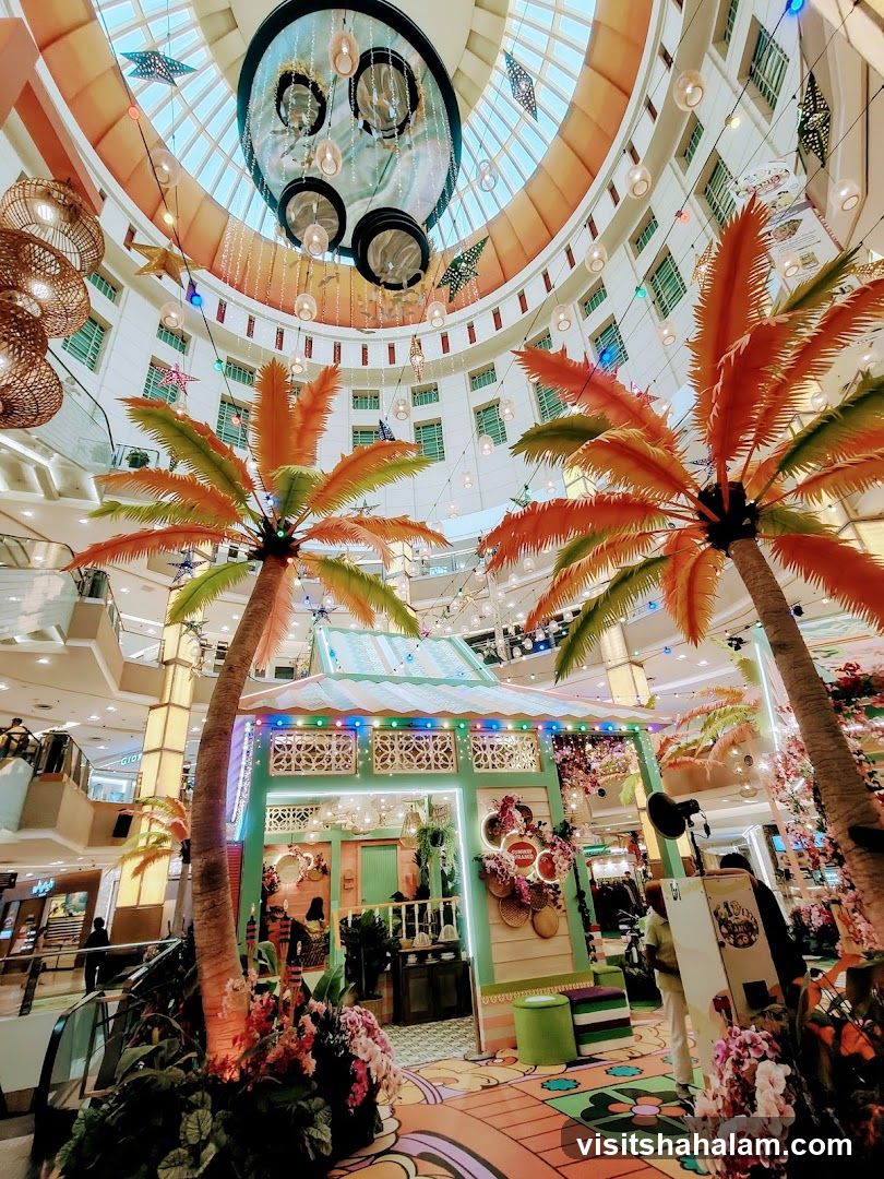 Tropical-themed mall interior with decorative stall