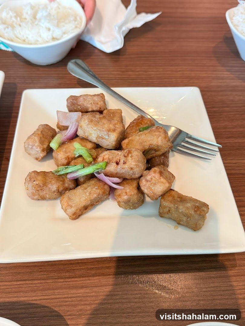 Fried Pork Bites with Onion and Scallions
