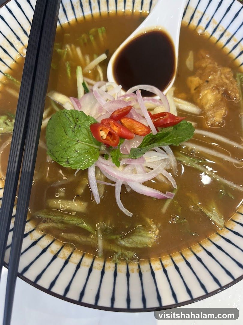 Laksa with garnishes