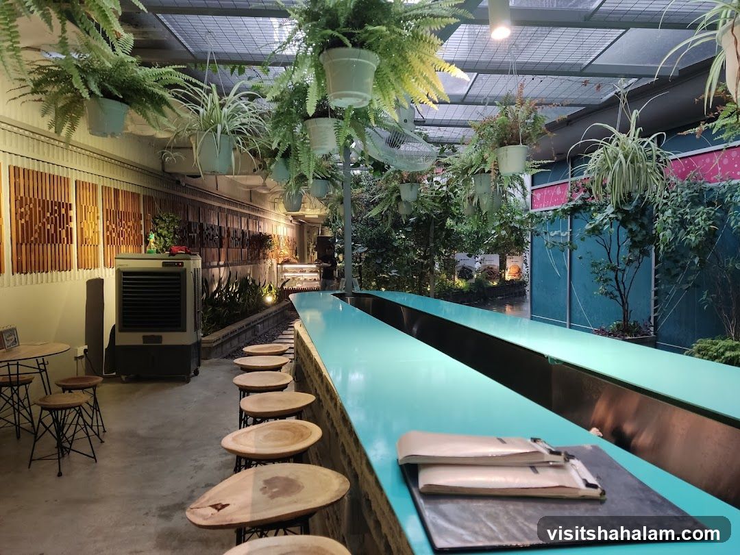 Restaurant Interior with Bar Seating and Hanging Plants