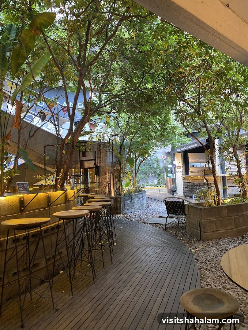Outdoor Seating Area with Bar Stools and Plants