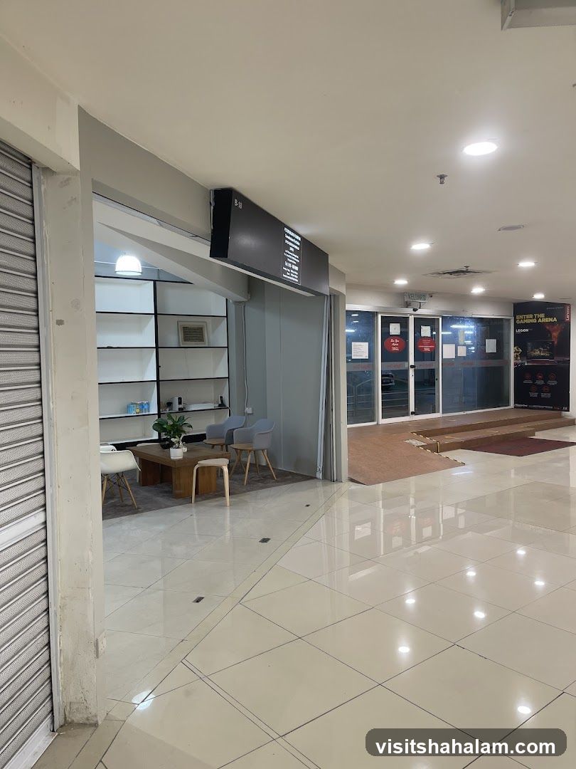 Indoor mall corridor with shop entrances