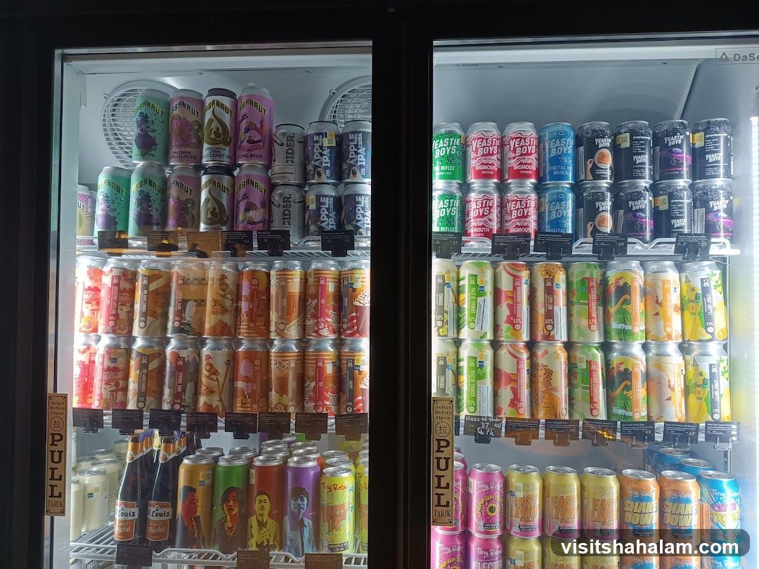 Cans of Beer and Cider in Refrigerator