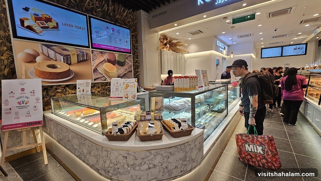 Bakery Interior with Pastries and Customers