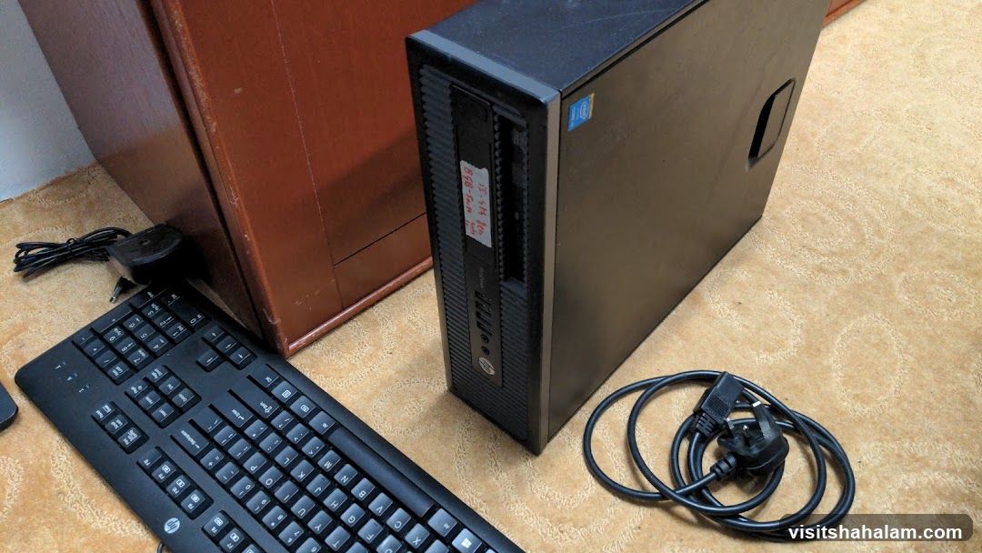 Desktop computer with keyboard and cables