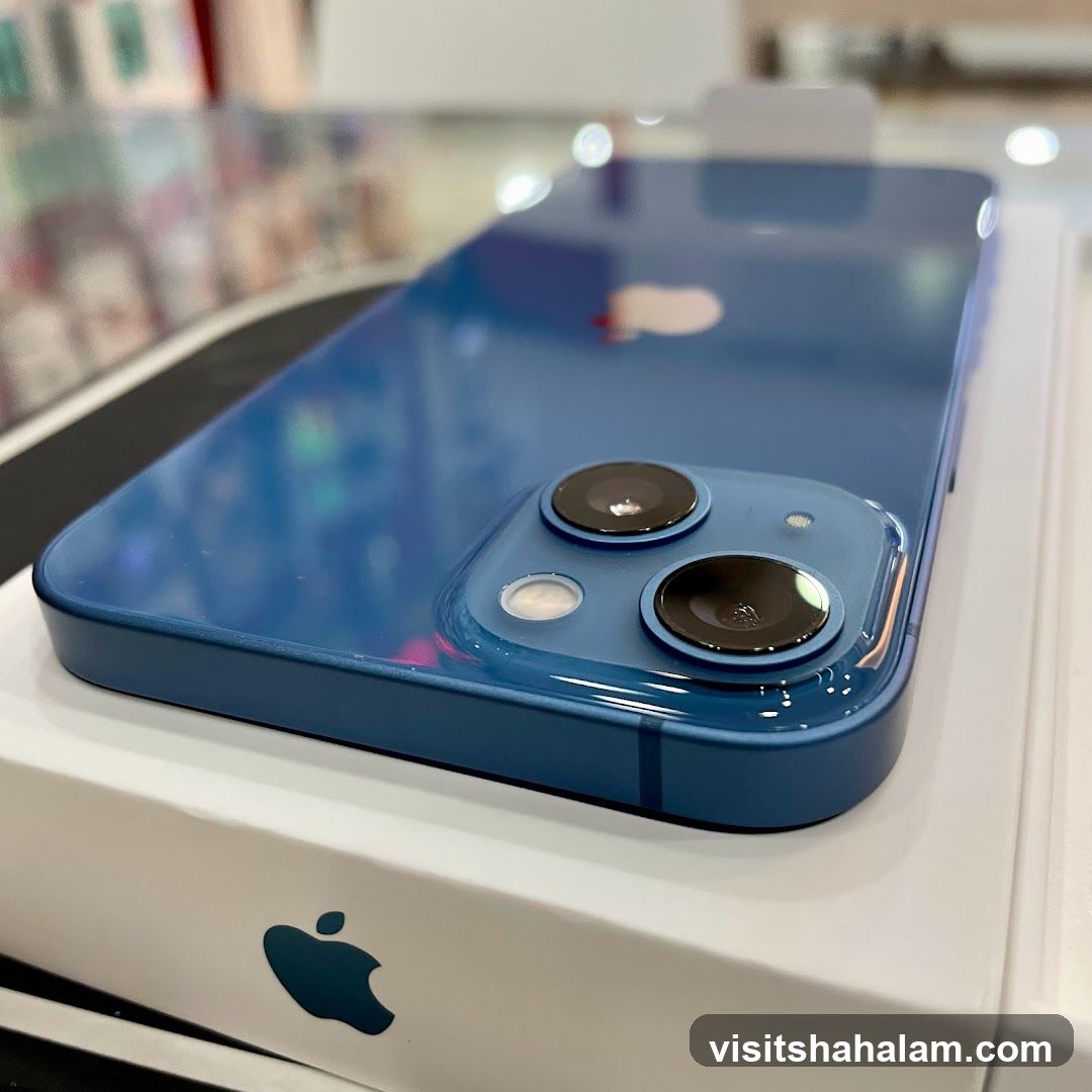 Blue iPhone on Apple Box