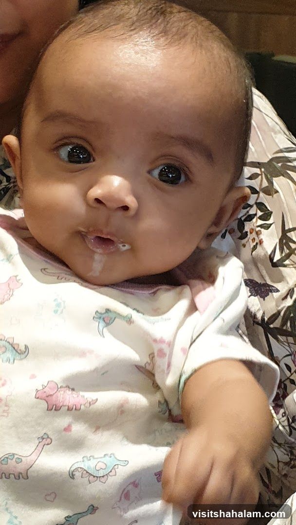 Baby with milk dribble