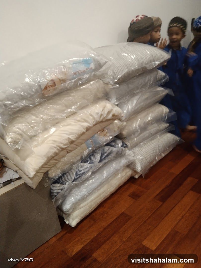 Pillows stacked in plastic packaging