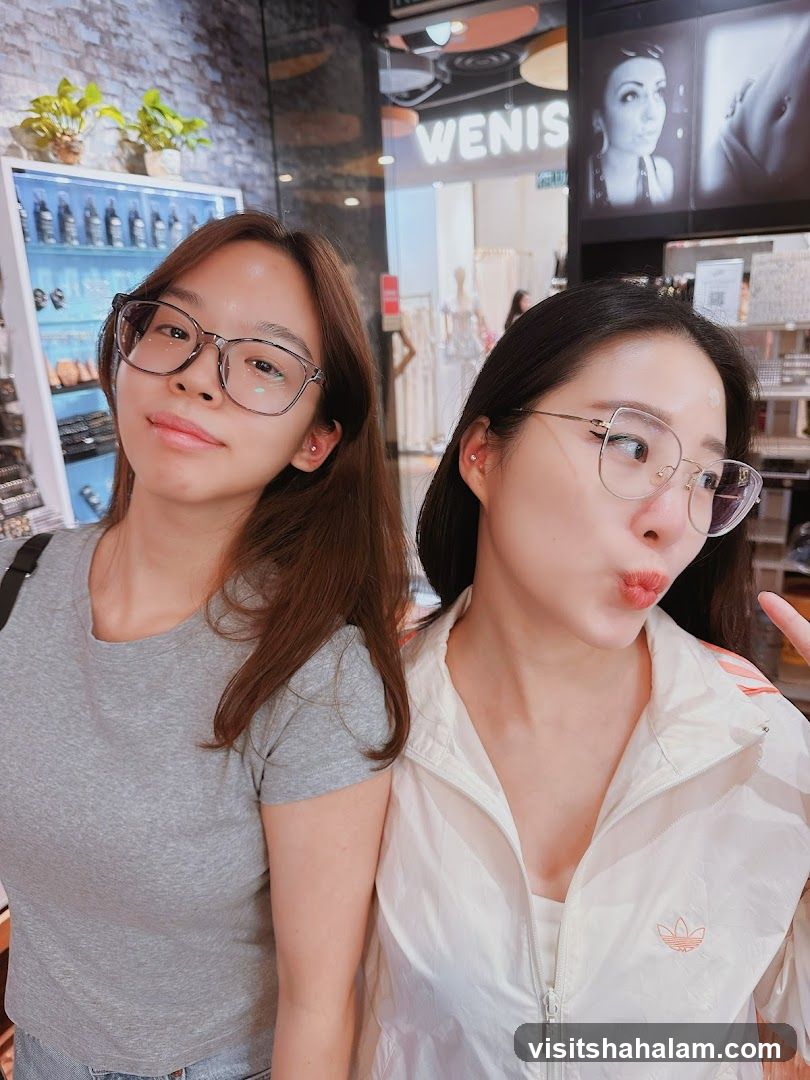 Two Women Posing in a Store