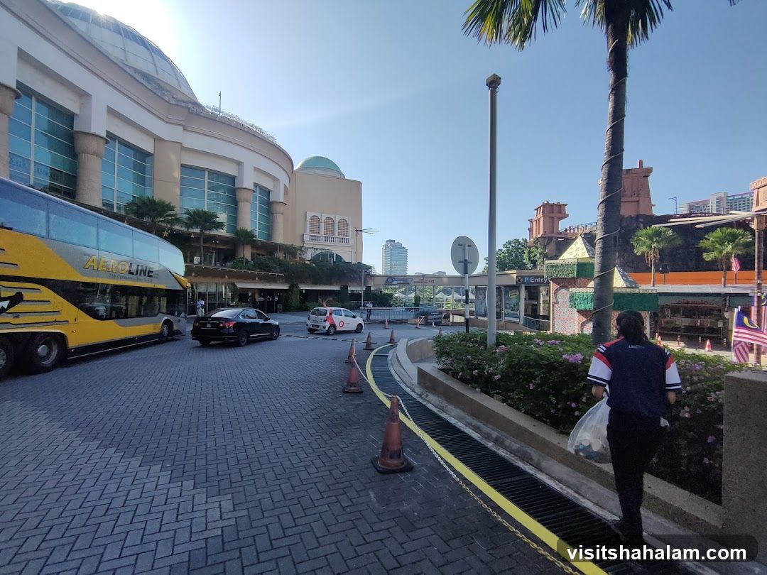 Street Scene with Aeroline Bus and Mall Entrance