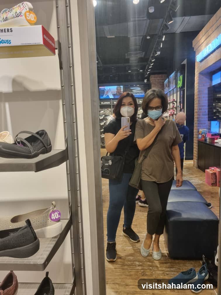 Two Women in a Shoe Store