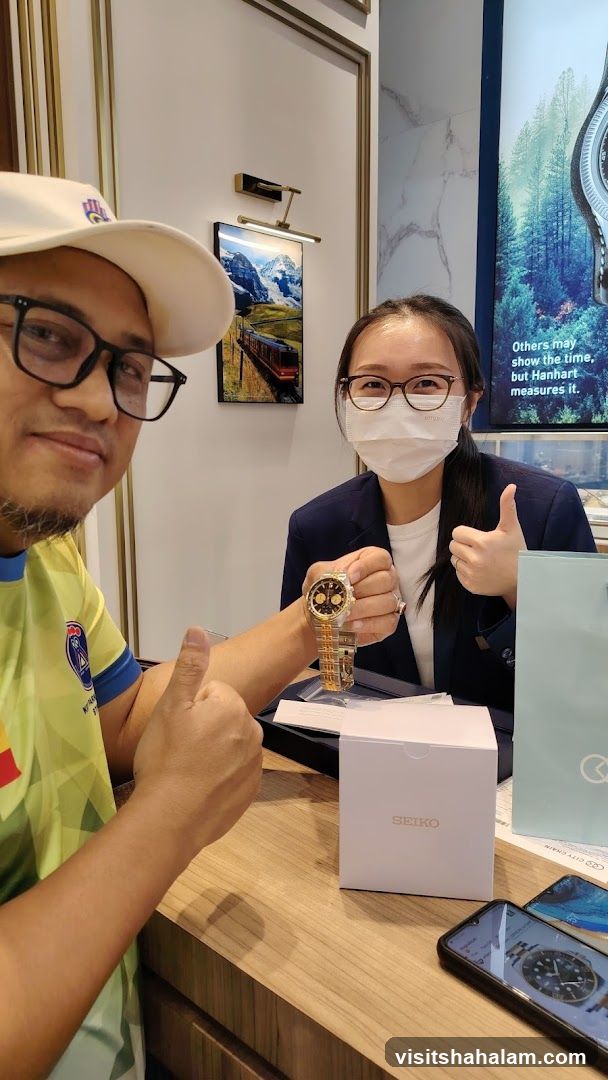 Customer and Salesperson with Watch
