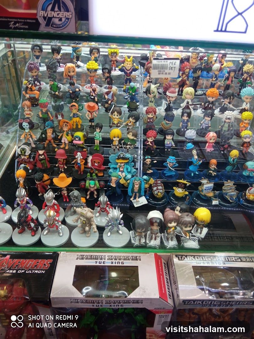 Display of Anime and Superhero Figurines